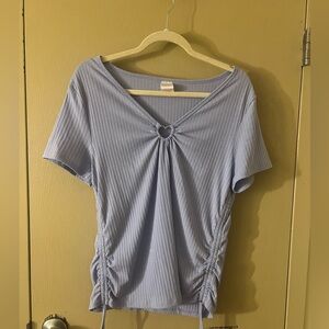 light blue ribbed top front twist with a decorative heart-shaped ring